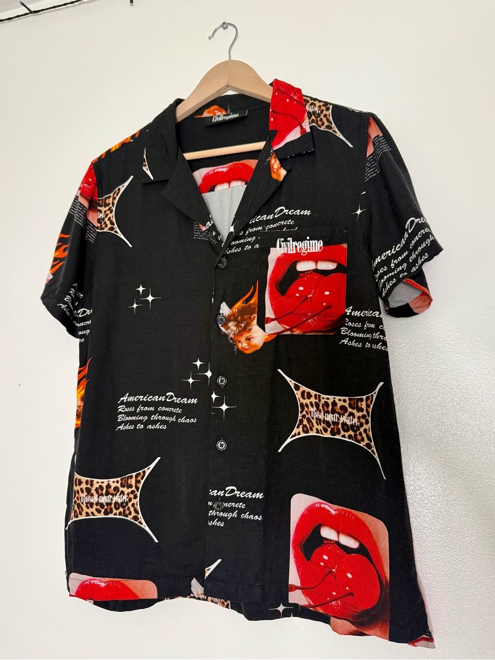 Civil Regime Vintage-Inspired Black Short Sleeve Shirt with Red Graphic Print